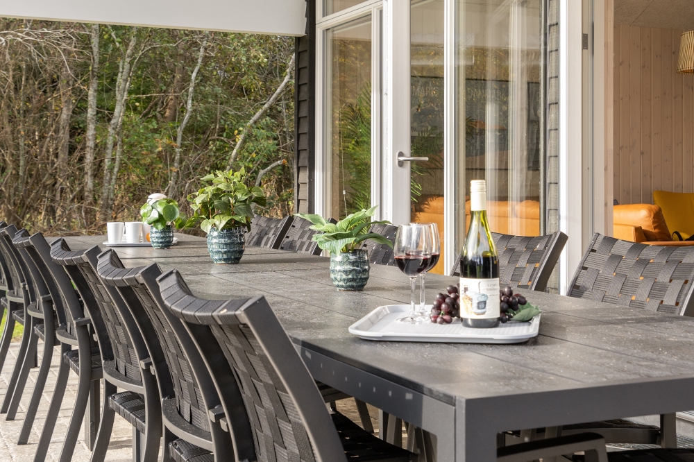 Genießen Sie einen Grillabend auf der Terrasse des Luxusferienhauses Nr. 568 in Westjütland
