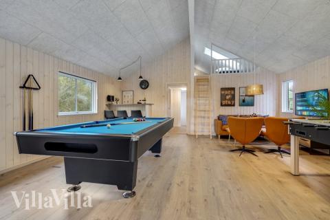 Neben den vielen schönen Stunden, die man im Poolbereich des Hauses verbringen kann, bietet das Luxusferienhaus 568 auch Spielevergnügen bei Billard/Tischtennis und Darts