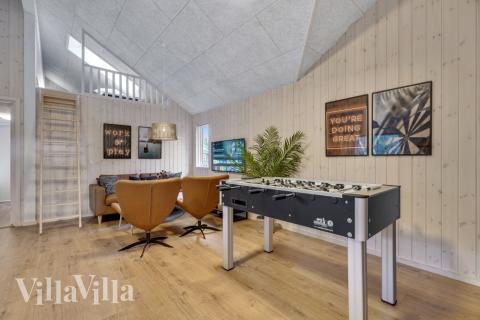 Das Luxusferienhaus 568 für 16 Personen hat einen großen Aktivitätsraum mit u. a. Billard und Darts