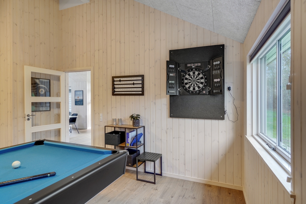 Aktivitätsraum im Luxusferienhaus Nr. 568 mit 6 Schlafzimmern und Platz für 16 Gäste.