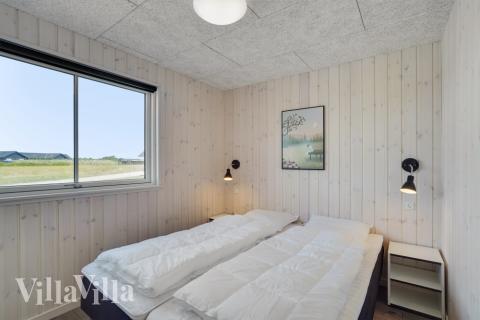 Eines der 7 Schlafzimmer im Luxusferienhaus Nr. 547