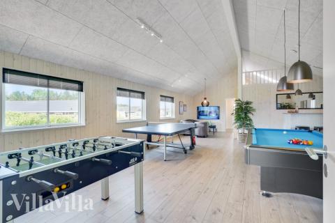 Neben den vielen schönen Stunden, die man im Poolbereich des Hauses verbringen kann, bietet das Luxusferienhaus 547 auch Spielevergnügen bei Billard/Tischtennis und Darts