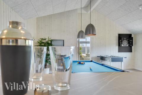 Zu dem attraktiven Ferienhaus Nr. 547 in Limfjord gehört auch ein tolles Angebot im Außenbereich, z. B. Spieleturm und Schaukeln