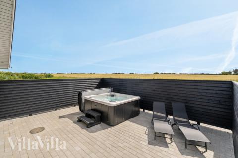 Im Luxusferienhaus Nr. 547 gibt es einen Whirlpool und 7 Schlafzimmer.