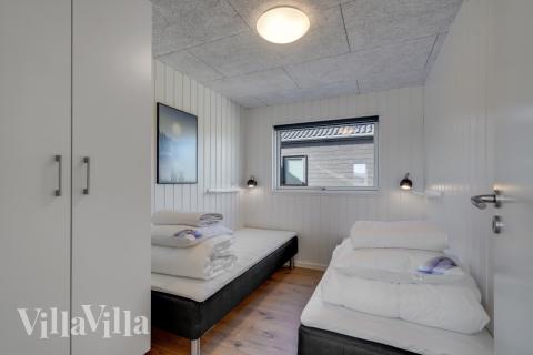 Eines der 7 Schlafzimmer im Luxusferienhaus Nr. 558