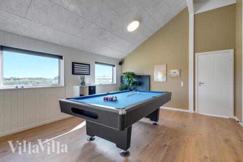 Aktivitätsraum im Luxusferienhaus Nr. 558 mit 7 Schlafzimmern und Platz für 18 Gäste.