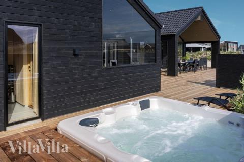 Das Luxusferienhaus Nr. 558 hat eine tolle Terrasse, die mit hochwertigen Gartenmöbeln für 18 Personen ausgestattet ist.