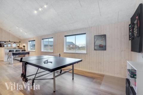 Das Luxusferienhaus 545 für 18 Personen hat einen großen Aktivitätsraum mit u. a. Billard und Darts