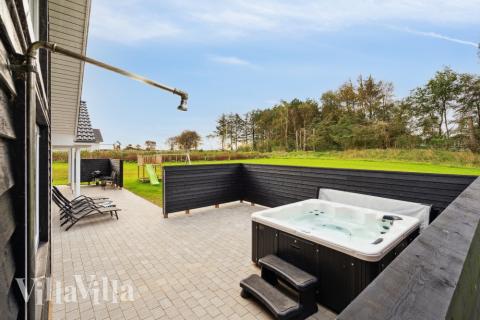 Das Luxusferienhaus Nr. 545 bietet u. a. einen tollen Whirlpool