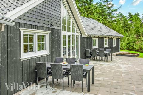 Das Luxusferienhaus Nr. 570 hat eine tolle Terrasse, die mit hochwertigen Gartenmöbeln für 14 Personen ausgestattet ist.