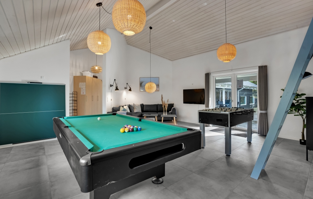 Aktivitätsraum im Luxusferienhaus Nr. 571 mit 8 Schlafzimmern und Platz für 22 Gäste.