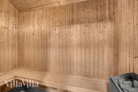 Genießen Sie die heiße Sauna im Luxusferienhaus Nr. 571 für 22 Personen
