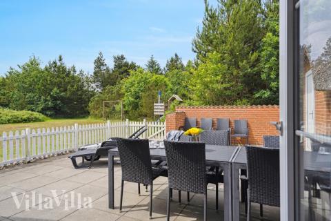 Das Luxusferienhaus Nr. 572 hat eine tolle Terrasse, die mit hochwertigen Gartenmöbeln für 12 Personen ausgestattet ist.