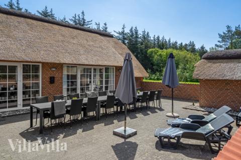 Das Luxusferienhaus Nr. 574 hat eine tolle Terrasse, die mit hochwertigen Gartenmöbeln für 12 Personen ausgestattet ist.