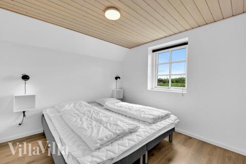 Eines der 7 Schlafzimmer im Luxusferienhaus Nr. 575