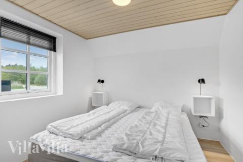 Eines der 7 Schlafzimmer im Luxusferienhaus Nr. 576