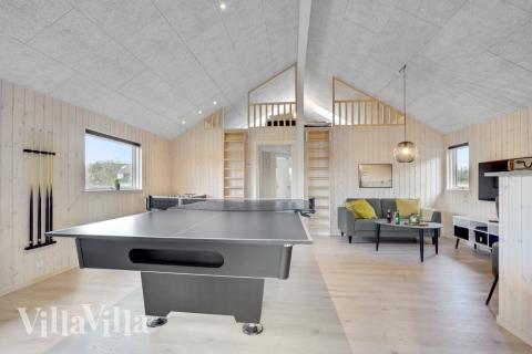 Das Luxusferienhaus 553 für 16 Personen hat einen großen Aktivitätsraum mit u. a. Billard und Darts