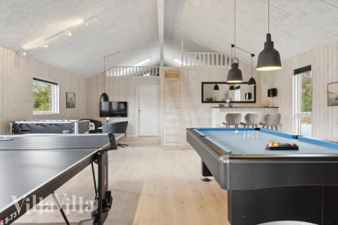 Aktivitätsraum im Luxusferienhaus Nr. 577 mit 7 Schlafzimmern und Platz für 18 Gäste.