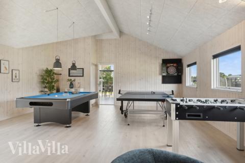 Neben den vielen schönen Stunden, die man im Poolbereich des Hauses verbringen kann, bietet das Luxusferienhaus 577 auch Spielevergnügen bei Billard/Tischtennis und Darts
