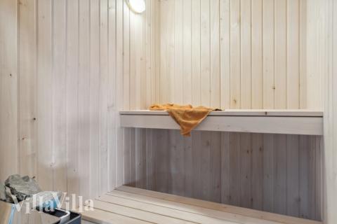 Genießen Sie die heiße Sauna im Luxusferienhaus Nr. 577 für 18 Personen