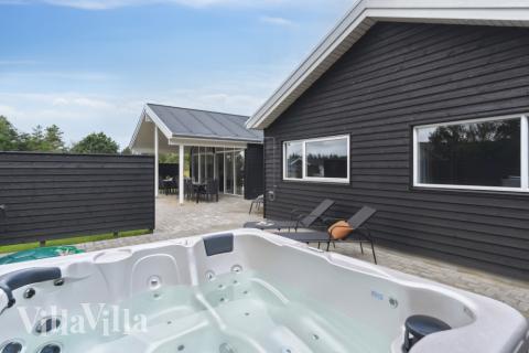 Das Luxusferienhaus Nr. 577 bietet u. a. einen tollen Whirlpool