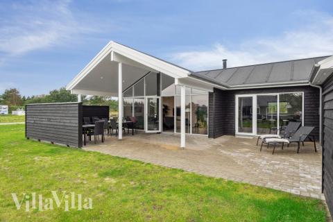 Das Luxusferienhaus Nr. 577 hat eine tolle Terrasse, die mit hochwertigen Gartenmöbeln für 18 Personen ausgestattet ist.