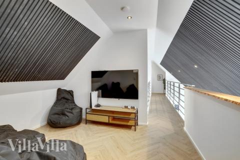 Aufenthaltsraum mit Platz für 16 im Luxusferienhaus Nr. 580.