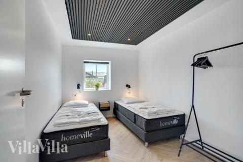 Eines der 8 Schlafzimmer im Luxusferienhaus Nr. 580