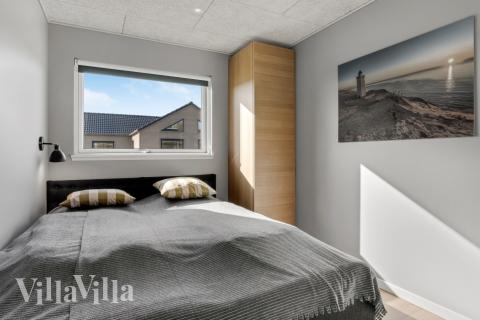 Eines der 10 Schlafzimmer im Luxusferienhaus Nr. 554