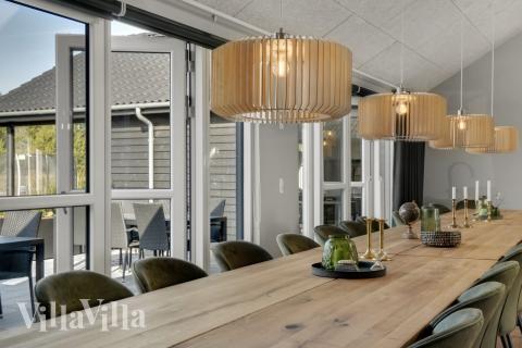 Aufenthaltsraum mit Platz für 26 im Luxusferienhaus Nr. 554.