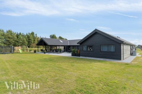 Dieses schöne Poolhaus Nr. 554 mit Platz für 26 Personen liegt in Westjütland