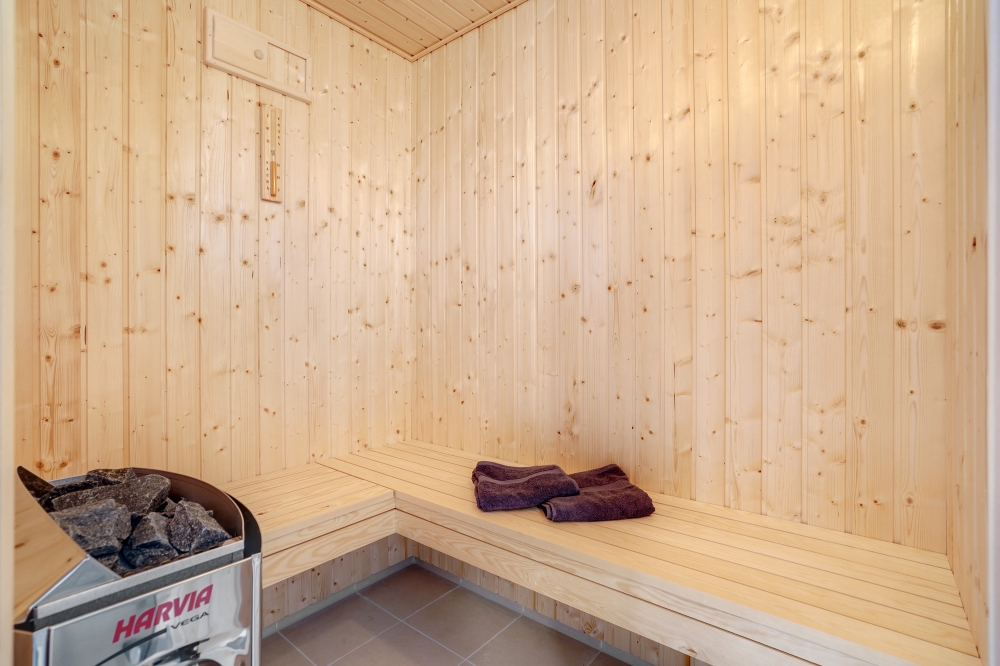 Genießen Sie die heiße Sauna im Luxusferienhaus Nr. 578 für 12 Personen