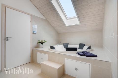 Genießen Sie den warmen Whirlpool im Luxusferienhaus Nr. 578 in Lolland/Falster/Mön