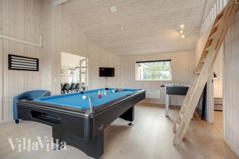 Aktivitätsraum im Luxusferienhaus Nr. 578 mit 4 Schlafzimmern und Platz für 12 Gäste.