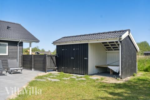 Zu dem attraktiven Ferienhaus Nr. 578 in Lolland/Falster/Mön gehört auch ein tolles Angebot im Außenbereich, z. B. Spieleturm und Schaukeln