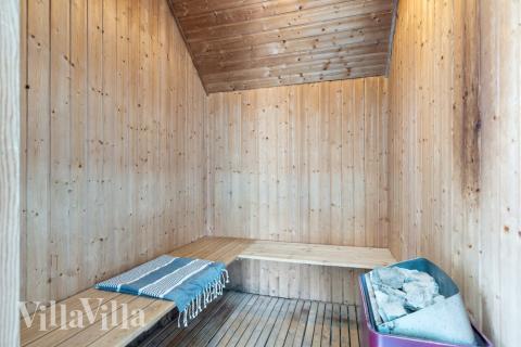 Genießen Sie die heiße Sauna im Luxusferienhaus Nr. 557 für 14 Personen