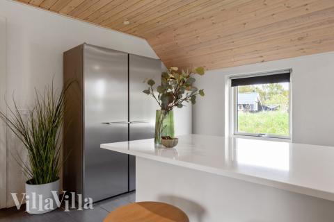 Gut ausgestattete Küche im Luxusferienhaus Nr. 557 in Westjütland.