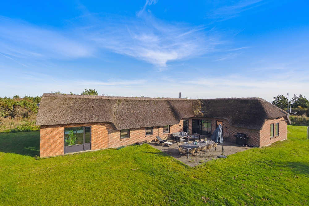 Dieses schöne Poolhaus Nr. 557 mit Platz für 14 Personen liegt in Westjütland