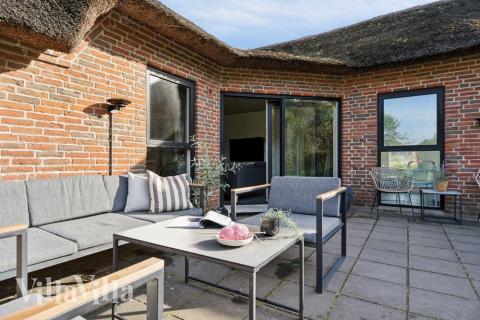 Das Luxusferienhaus Nr. 557 hat eine tolle Terrasse, die mit hochwertigen Gartenmöbeln für 14 Personen ausgestattet ist.