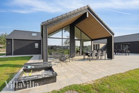 Das Luxusferienhaus Nr. 579 hat eine tolle Terrasse, die mit hochwertigen Gartenmöbeln für 26 Personen ausgestattet ist.