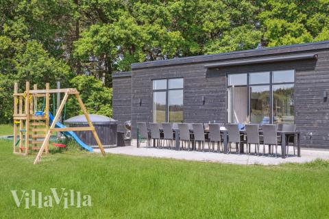 Das Luxusferienhaus Nr. 581 hat eine tolle Terrasse, die mit hochwertigen Gartenmöbeln für 16 Personen ausgestattet ist.