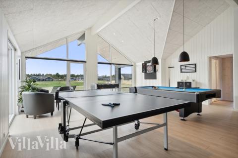 Neben den vielen schönen Stunden, die man im Poolbereich des Hauses verbringen kann, bietet das Luxusferienhaus 583 auch Spielevergnügen bei Billard/Tischtennis und Darts