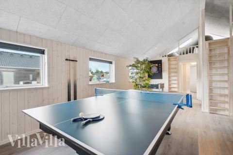 Das Luxusferienhaus 601 für 18 Personen hat einen großen Aktivitätsraum mit u. a. Billard und Darts