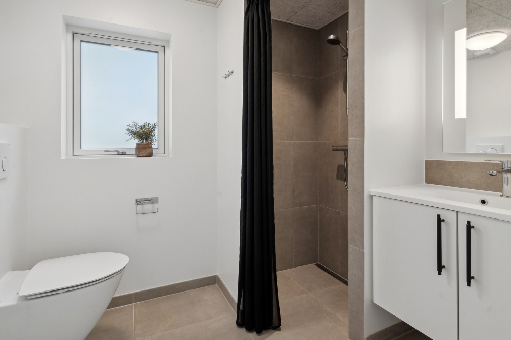 Eines der Badezimmer im Luxusferienhaus Nr. 593