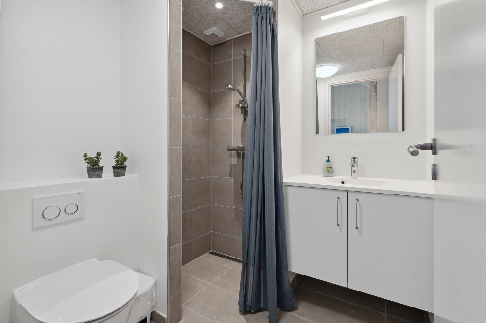 Eines der Badezimmer im Luxusferienhaus Nr. 594