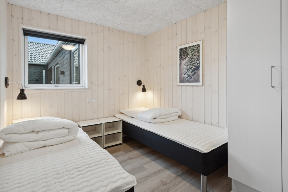 Eines der 8 Schlafzimmer im Luxusferienhaus Nr. 594