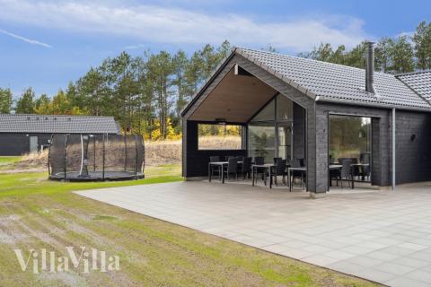 Zu dem attraktiven Ferienhaus Nr. 594 in Südjütland gehört auch ein tolles Angebot im Außenbereich, z. B. Spieleturm und Schaukeln