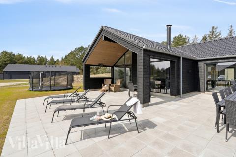 Das Luxusferienhaus Nr. 594 hat eine tolle Terrasse, die mit hochwertigen Gartenmöbeln für 20 Personen ausgestattet ist.