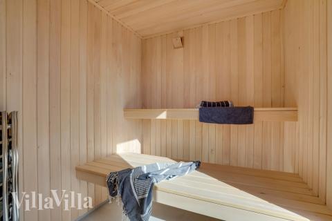 Genießen Sie die heiße Sauna im Luxusferienhaus Nr. 596 für 20 Personen
