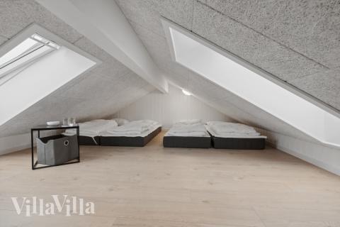 Der große ausgebaute Dachboden im Luxusferienhaus Nr. 596 für 20 Personen